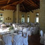 Set up of a wedding dinner in the ballroom