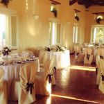 Set up of a wedding dinner in the ballroom