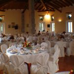 Set up of a wedding dinner in the ballroom