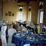 Set up of a wedding dinner in the ballroom